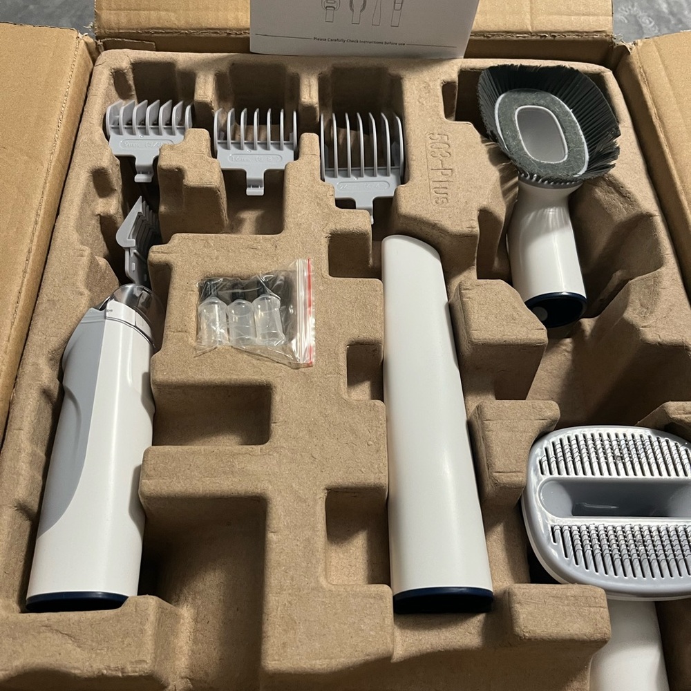 White and Gray Dog or Cat Grooming Kit and Vacuum